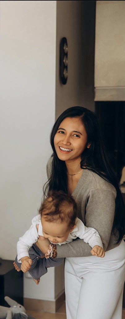 Mayang (@momlearnstech) with her baby